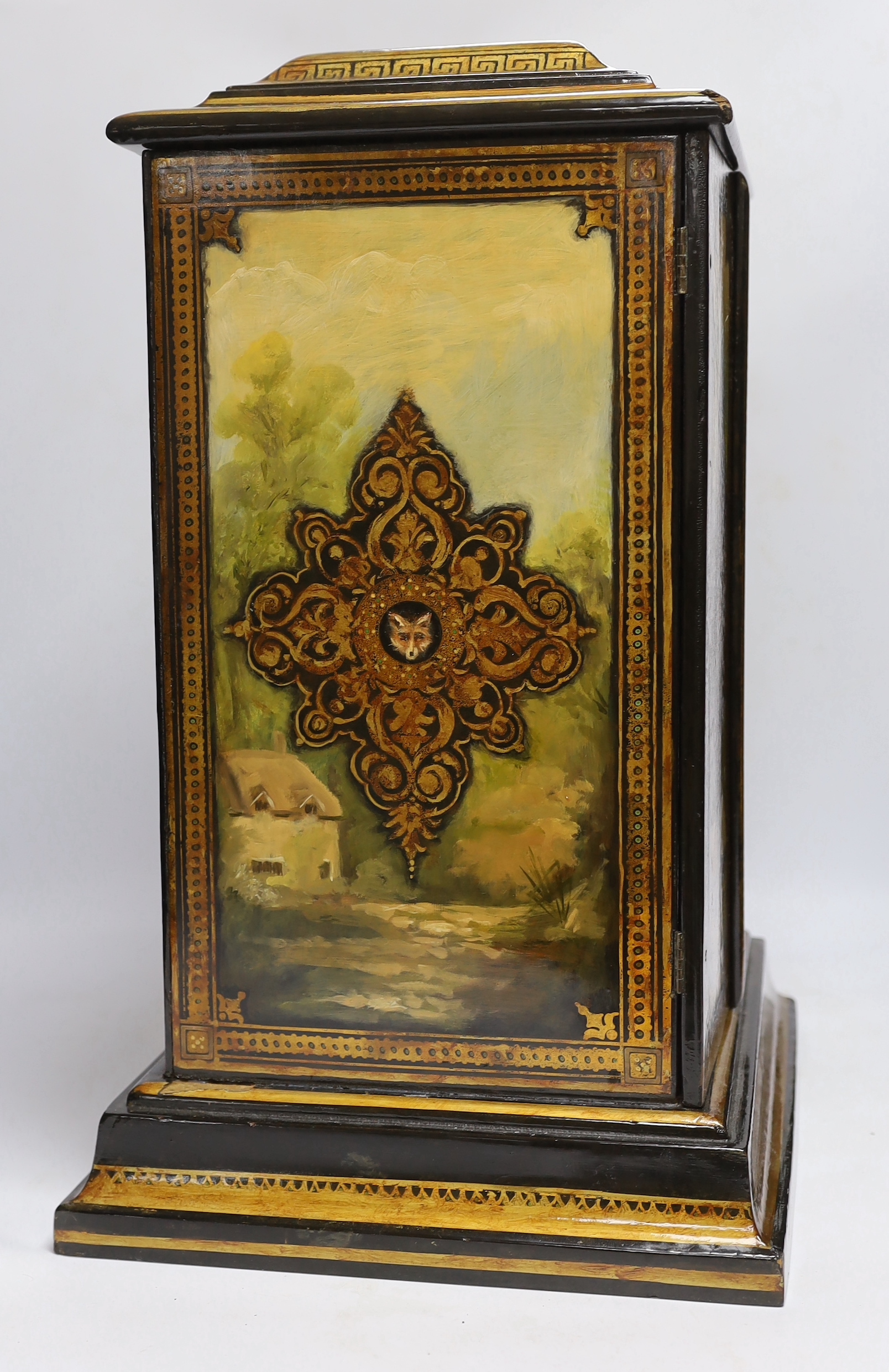 A Victorian painted papier maché decanter box, 51cm high x 36cm wide